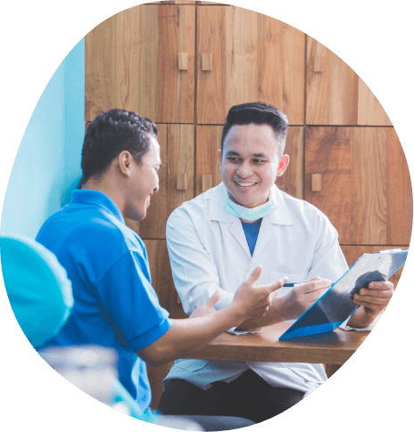 Man talking to sleep doctor about insomnia treatment