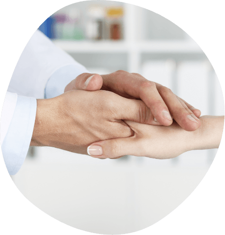 Medical professional shaking hands with a patient