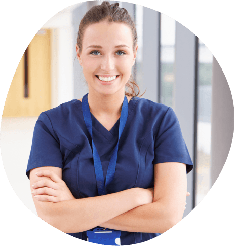 Smiling sleep center team member in blue scrubs