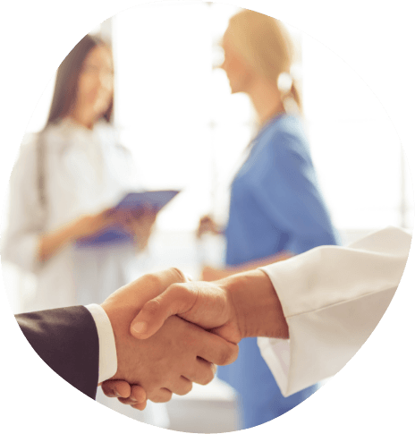 Patient and doctor shaking hands
