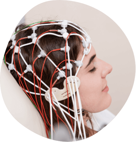 Young woman with several electrodes on her head for a sleep test