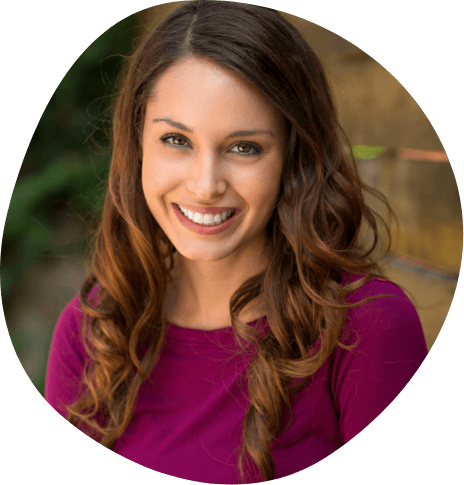 Smiling woman in magenta blouse