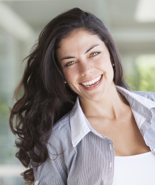 Woman smiling after sleep disorder treatment in Dallas
